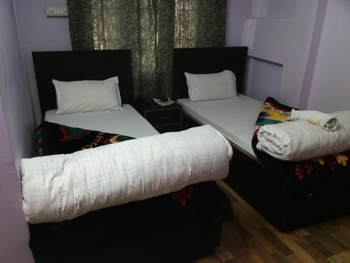 Vamoose Buddha Hotel 达旺 外观 照片